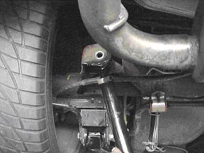 6) Install the Hotchkis panhard rod back into the mounting points the stock bar used.