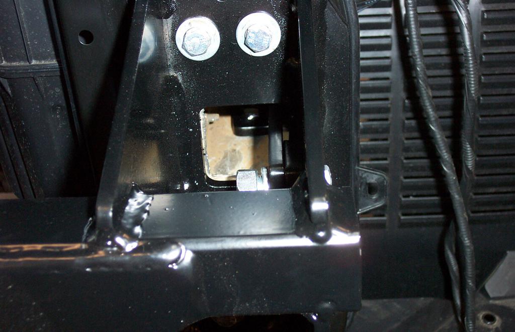 Starting with the driver's side, place the rear brace in the opening of the frame rail (Fig.N). Fig.