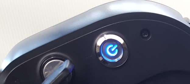 A blue light will appear on the button.