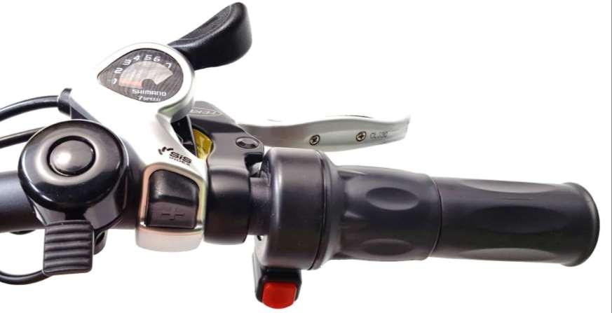 Right hand controls Push lever away from handle-bar to switch gears up (only switch gears while pedalling) Twist and go throttle BELL Push +