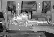CHASSIS TO INSTALL TRANSAXLE FOR SAFETY: Before Leaving Or Servicing Machine; Stop On Level Surface, Place Shifter