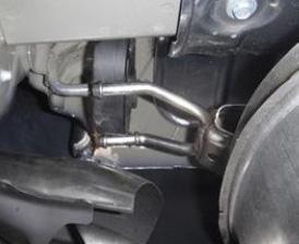 Lower the exhaust by removing 5 rubber isolators ( on each muffler