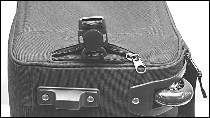 The zipper pulls will remain locked in place no matter where they are positioned along the zipper track.. Side strap. Backrest mounting buckle Figure. Side Strap and Backrest Mounting Buckle 4.