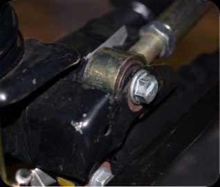 Step 4: Install Steering Stabilizer Axle Mount I. Using a 21mm socket disconnect the track bar on the axle side (passenger side) and remove from bracket. Keep Hardware. J.
