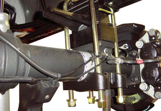 OE Block OE brake line bracket to the drop bracket using the 8mm hardware from kit