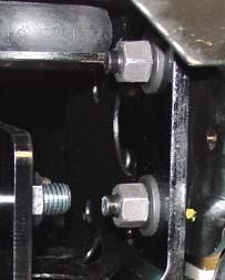Insert the front arm braces and secure with 5/8" draw pins and safety