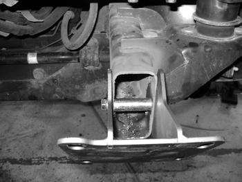 7/16 x 3-1/2 bolt, nut and washers. Leave hardware loose Figure 9. Figure 9 28. Install the front bumper on the new brackets and fasten with the factory nuts.