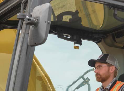 NEW CAB TAKES THE HARD OUT OF WORK Sites where excavators typically work are rugged and challenging.