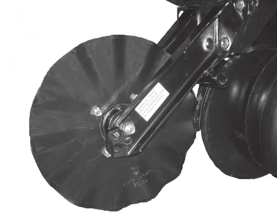 B) ()A5 Coulter Arm Assembly )D7804 " Bubbled Blade Row unit mounted no till coulters with " bubbled," fluted or ¾" fluted blades may be used on pull row units and/ or push row units.