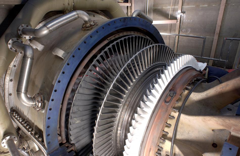 OpenStax-CNX module: m55411 9 Figure 5: Steam turbine/generator. The steam produced by burning coal impacts the turbine blades, turning the shaft which is connected to the generator.