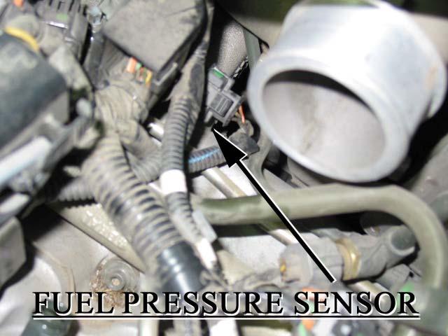 Locate the fuel pressure sensor connector.