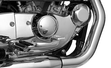 SPORTSTER TAPPET BLOCK COVER Extending chrome all the way from the pushrod tubes to the gear case cover, this chrome-plated, one-piece, diecast cover features a raised