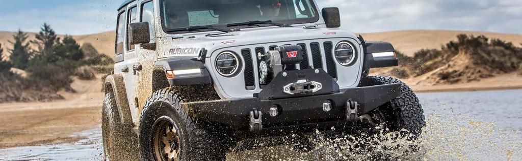 CRAWLER SERIES FRONT BUMPER FOR JEEP JL AND JK WRANGLER EXTREME OFF-ROAD PERFORMANCE WITH HIGH-CLEARANCE, TAPERED ENDS, AND MAXIMUM APPROACH ANGLES.