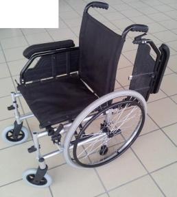 backwards Stand in front of the wheelchair; Push the black lever