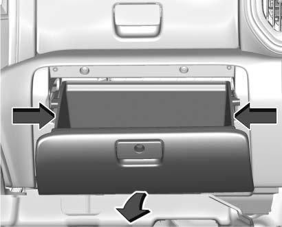 1. Open the lower glove box door completely. 2. Press the sides of the glove box door inward and rotate the door downward to remove. 3.