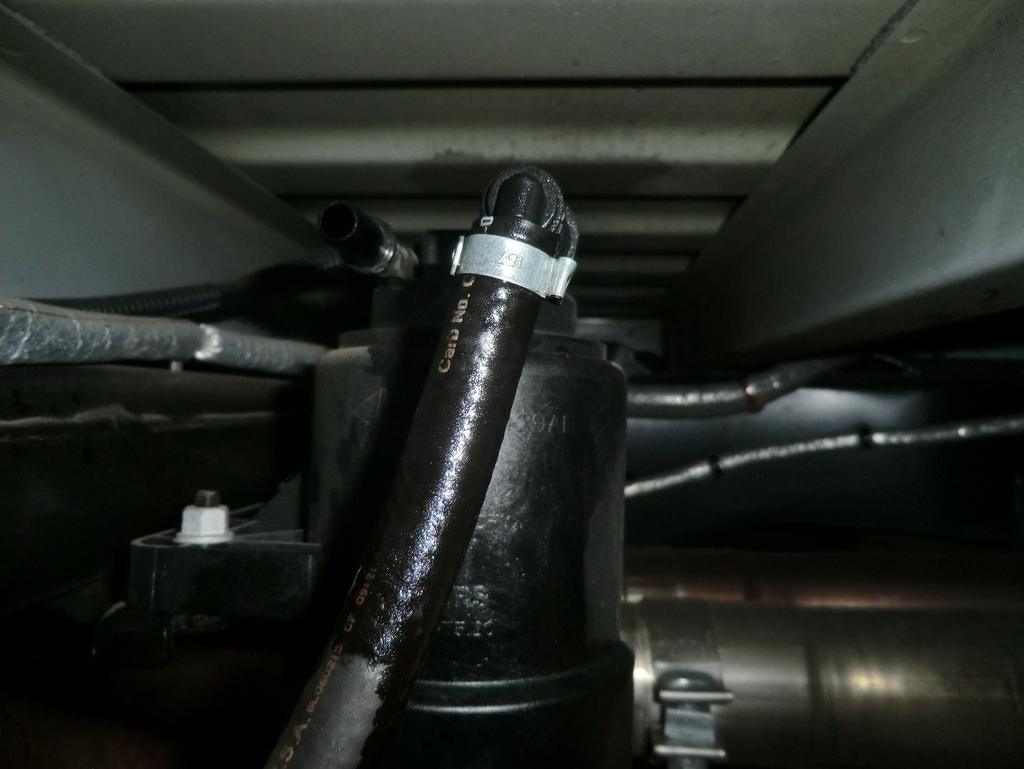 Factory filter outlet Engine fuel supply line shown in Photo above. 7.