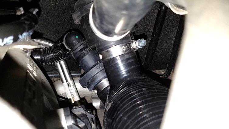 25. Install the breather check valve you modified in Step 19.