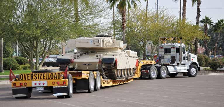 BIG BOY TOYS When your toy is a 65-ton tank, transporting it to and from the sandbox can prove to be a challenge. That is, of course, unless you have a semitruck at your disposal.