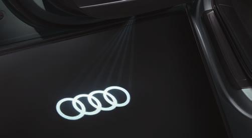 Depending on the variant, either the quattro logo or the Audi rings are projected onto the ground by means of an LED light when the vehicle door