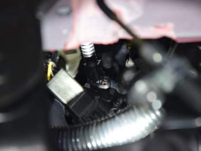 To do this you must disconnect the stock wiring harness at the Boost Pressure sensor located on the passenger side of the