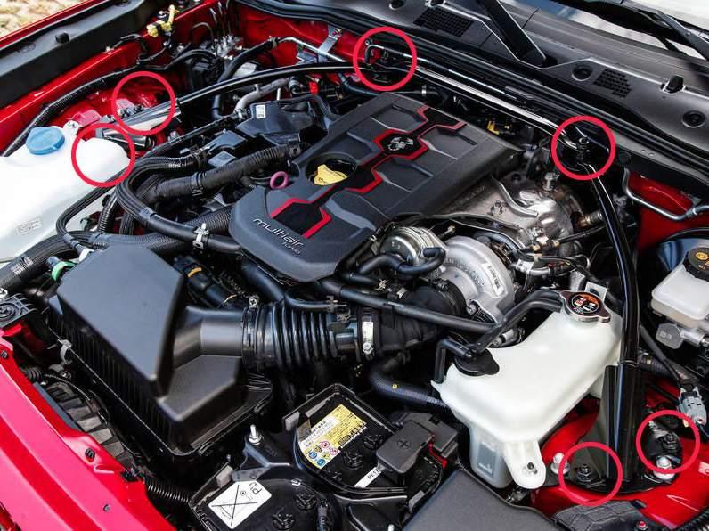 Remove Strut Bar: Disconnect the negative (black) terminal from the battery using a 10mm wrench