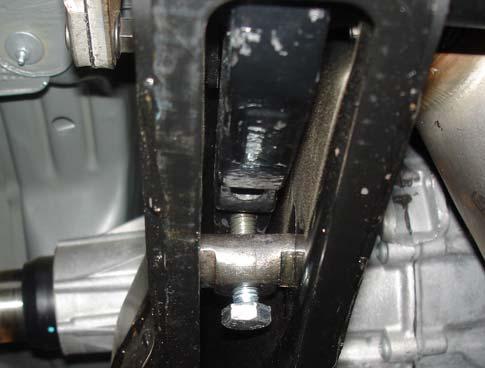 Starting on the driver s side, remove the torsion bar adjusting screw.