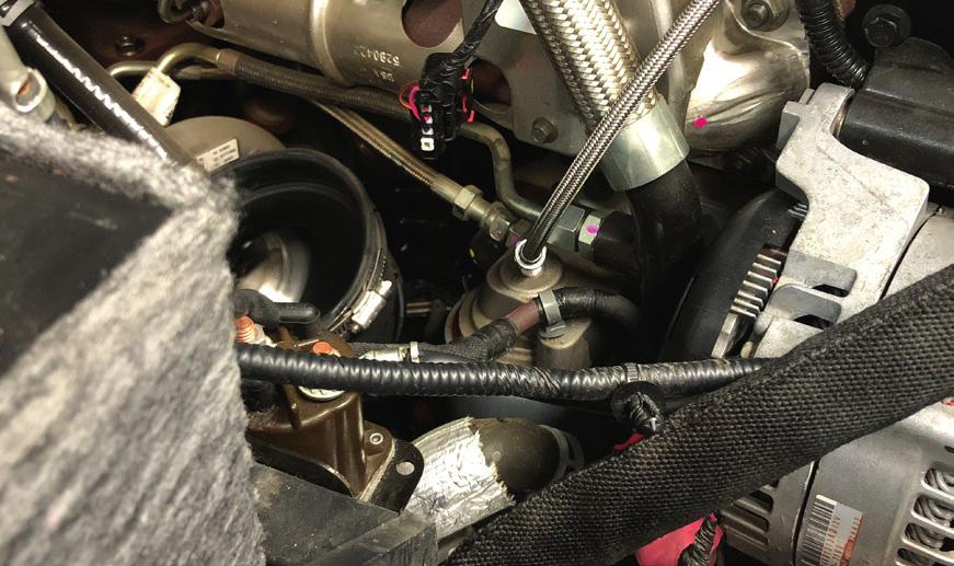 (Image 4) Now that you have access to the oil filter housing, remove the /8 NPT plug using a 7/6 wrench and
