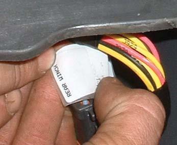 6. Install the winch disable switch (item 42) and the switch guard (item 43) into the switch panel.