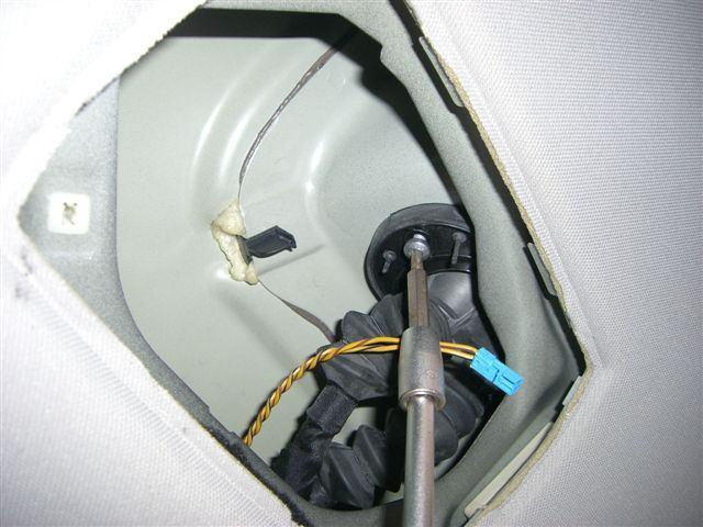 Page: 5 from 10 Remove the single screw (torx) which holds the cableloom in place: From here you can retire the cables
