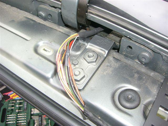 (1 came off completely, 3 had a severe cut): Next I cut all the wires in the interior