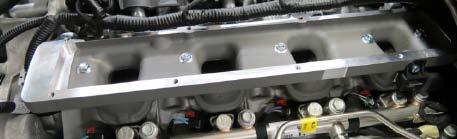Remove the protective tape from the passenger side cylinder head.