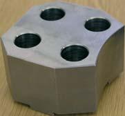 105 Workpiece-specific top jaws can be placed on the tongue and groove interface of the ball bolts.