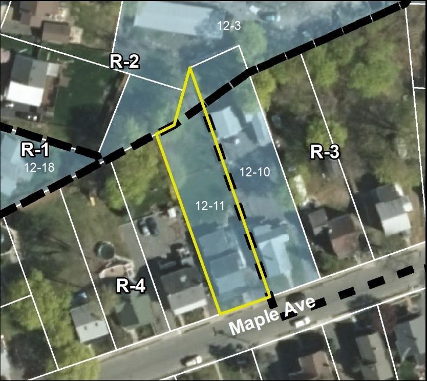 R-3 (majority of property) 2 single-family homes on one lot Re-zone entirely in