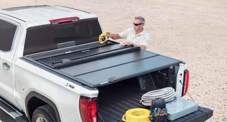 rugged synthetic hinges and seals 6 RETRACTABLE TONNEAU COVER BY ROLL-N-LOCK Incorporates a tough, vinyl-over-aluminum laminated construction Features a heavy-duty torsion spring for fast, reliable