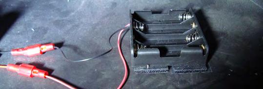 Connect the red and black wires from the battery holder to the red and black wires from the valve