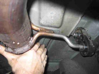 Be sure to move the rear differential vent hose out of the way when performing this operation. (See Fig.