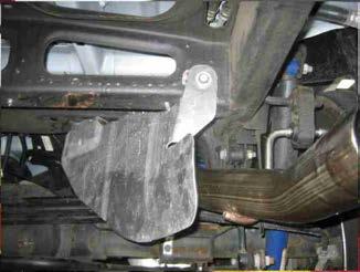 Exhaust System Installation 4) Replace the heat shield using a 15mm socket and ratchet. (See Fig.
