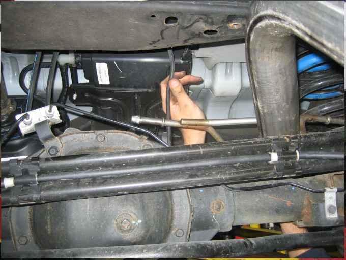 the tailpipe over the rear axle and backwards under the rear