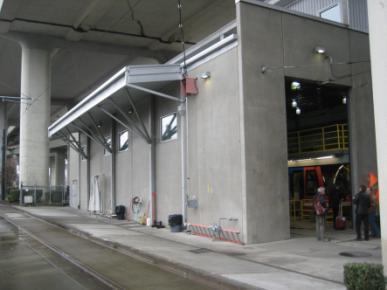Figure 8.4: Small Maintenance Facility Built Under A Highway Bridge in Portland, Oregon 8.04 FINDINGS The study team developed test-fit site plans for the three alternative sites.