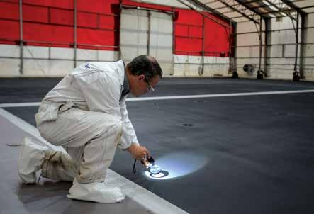 THE THERMAL COATING IS APPLIED ON THREE OF THE CARRIER'S FIVE LANDING SPOTS TO PROVIDE OPERATIONAL CAPABILITIES FOR THE JSF.