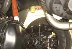 Install the new steering stabilizer on new studs and tighten all nuts. (See Photo #25) Photo #21A Photo #22 Rear Installation: 33.