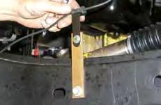 Install bolt through top hole in bracket, and the frame and place the large 3/8 fender washer on top of the frame and secure with a 3/8 nut.