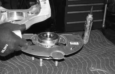 35. Locate FTS20641D or FTS20640D (Driver Knuckle), assemble the new spindle on the hub