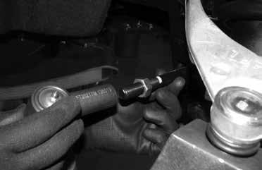 Attach the new tie rod end to the spindle with the supplied nut and torque to