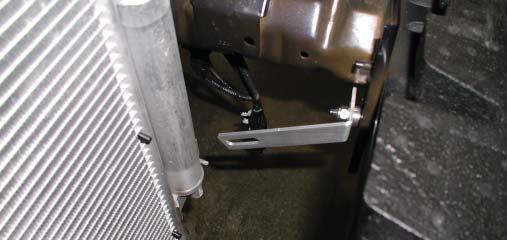 Slide the bracket onto the bolt end and loosely secure using the provided M8 washer and lock nut.