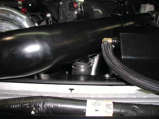 12 Install the cold air inlet elbow tube into the silicone coupler with a 3.38 t-bolt clamp.