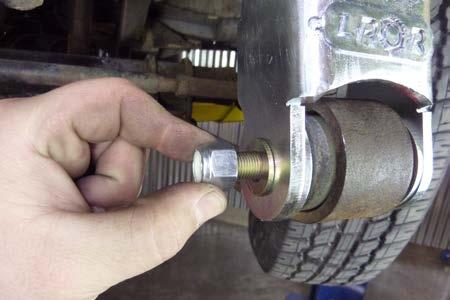 Note: Again, be careful not to damage the threads on the bolt.