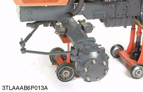 Separate the front axle from the front axle support. 4. Remove the front wheels.