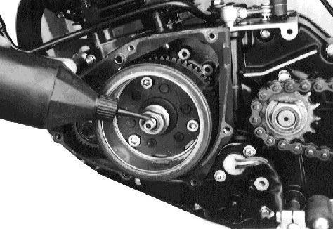 3-53 ENGINE MAGNETO ROTOR Fit the key into the key slot on the crankshaft.