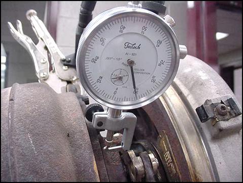 These measurements can be taken by using the dial indicator and clamping arm from Detroit Diesel tool P/N: TLZ00100. See Figures 3 and 4.